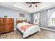 Comfortable main bedroom with tray ceiling and hardwood floors at 1626 Riverglenn Ct, Rock Hill, SC 29732