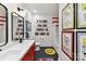 Fun bathroom featuring a double vanity, tile floor, and inspiring art for a creative and refreshing space at 164 Twin Sisters Ln, Mooresville, NC 28117