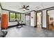 Home gym with black trim, exercise equipment and natural light creates a great workout space at 164 Twin Sisters Ln, Mooresville, NC 28117