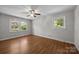Bright bedroom featuring neutral walls, hardwood flooring, and a ceiling fan at 1810 Country Manor Ln # 34, Rock Hill, SC 29730