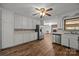 Eat-in kitchen featuring white cabinets, stainless steel appliances, and hardwood floors at 1810 Country Manor Ln # 34, Rock Hill, SC 29730