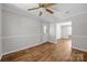Hardwood floors grace this comfortable living room featuring a ceiling fan at 1810 Country Manor Ln # 34, Rock Hill, SC 29730