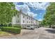 Well-maintained condo building with ample parking and mature landscaping in a desirable community at 18605 Ruffner Dr # 3E, Cornelius, NC 28031