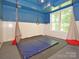 Basement space with exercise equipment, perfect for a home gym at 20324 Middletown Rd, Cornelius, NC 28031
