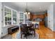 Bright kitchen with bay window, granite countertops, hardwood floors and stainless appliances at 20324 Middletown Rd, Cornelius, NC 28031