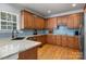 Spacious kitchen with granite countertops, stainless steel appliances, and custom cabinetry at 20324 Middletown Rd, Cornelius, NC 28031