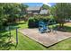 A safe and fun playground area for to play on, set against a leafy green backdrop and home at 20324 Middletown Rd, Cornelius, NC 28031