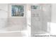 Stylish bathroom featuring a large soaking tub and a modern glass shower at 236 Wheatfield Dr # 102P, Statesville, NC 28677