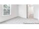 Bright bedroom featuring large windows and neutral carpet, creating a cozy and inviting space at 236 Wheatfield Dr # 102P, Statesville, NC 28677