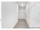 Organized walk-in closet with ample shelving and storage space at 236 Wheatfield Dr # 102P, Statesville, NC 28677