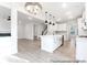Bright kitchen with a large island, open to the living area and staircase, offering seamless entertaining at 236 Wheatfield Dr # 102P, Statesville, NC 28677