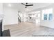 Open-concept living space with modern finishes and a kitchen view for easy entertaining at 236 Wheatfield Dr # 102P, Statesville, NC 28677