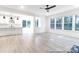 Spacious living area with an open layout, seamlessly connecting the kitchen and living room at 236 Wheatfield Dr # 102P, Statesville, NC 28677