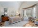 Serene bedroom with vaulted ceiling, natural light, hardwood floors and comfortable seating at 258 Patterson'S Bridge None, New London, NC 28127