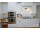 Modern kitchen featuring built-in stainless steel oven, cooktop, and granite countertops at 258 Patterson'S Bridge None, New London, NC 28127