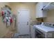 Laundry room with washer, dryer, hanging rack and shelving at 258 Patterson'S Bridge None, New London, NC 28127