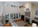 Bright living room with vaulted ceilings, stone fireplace, and serene views of the outdoors at 258 Patterson'S Bridge None, New London, NC 28127