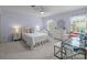 Light and airy bedroom with carpet floors, window with decorative curtains, and ceiling fan at 2709 Wamath Dr, Charlotte, NC 28210
