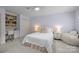 Bedroom featuring carpet floors, desk area, ceiling fan, and white closet doors at 2709 Wamath Dr, Charlotte, NC 28210