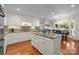 Bright kitchen with granite countertops, island, and stainless-steel appliances at 2709 Wamath Dr, Charlotte, NC 28210