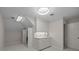 Well-lit laundry room with storage cabinets, folding counter and washer/dryer hookups at 2709 Wamath Dr, Charlotte, NC 28210