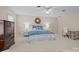Spacious main bedroom with carpet, ceiling fan, and natural lighting from the window at 2709 Wamath Dr, Charlotte, NC 28210