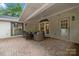 Covered patio perfect for relaxing or entertaining at 2709 Wamath Dr, Charlotte, NC 28210