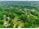 Scenic aerial shot of the home surrounded by mature trees in a tranquil neighborhood, address 2921 Ambrose Dr at 2921 Ambrose Dr, Gastonia, NC 28056