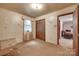 Bedroom with old carpet, deferred maintenance, and connections to other rooms in the house at 2921 Ambrose Dr, Gastonia, NC 28056