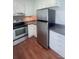 Efficient kitchen featuring stainless steel appliances, light cabinetry, and practical layout at 300 N Watterson St, Kings Mountain, NC 28086