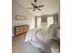 Spacious primary bedroom featuring a vaulted ceiling, hardwood floors, and ample natural light, offering a comfortable and airy feel at 3314 Mara Ct, Matthews, NC 28105