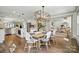 Open-concept dining area offering seamless flow to the kitchen and living spaces, great for entertaining at 343 Melbourne Ct, Charlotte, NC 28209