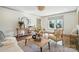 Inviting living room features hardwood floors, neutral decor, and a view to the exterior at 343 Melbourne Ct, Charlotte, NC 28209
