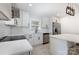 Stylish kitchen equipped with stainless steel appliances, white cabinets, and a functional island at 3615 Kempton Pl, Charlotte, NC 28208