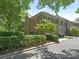 Two-story brick house features a side-entry garage and manicured hedges at 4026 Barclay Downs Dr, Charlotte, NC 28209