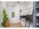 Cozy bedroom featuring a modern bunk bed, ample natural light, and minimalist decor at 411 Granby Cir, Charlotte, NC 28217