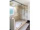 Luxurious bathroom featuring a walk-in shower and a large shower head at 435 Riverwalk Nw Dv, Concord, NC 28027