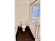 Bathroom featuring a toilet and frameless glass shower with tiled base at 435 Riverwalk Nw Dv, Concord, NC 28027