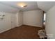 This bonus room features a small closet and entry to a bathroom at 435 Riverwalk Nw Dv, Concord, NC 28027
