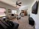 Open-concept living room offering views of the kitchen at 435 Riverwalk Nw Dv, Concord, NC 28027