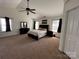 Primary bedroom with natural lighting and fan at 435 Riverwalk Nw Dv, Concord, NC 28027
