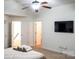 Primary bedroom featuring TV, carpets, and natural lighting at 435 Riverwalk Nw Dv, Concord, NC 28027