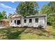Charming single-story home featuring a brick facade, updated landscaping, and a inviting front porch at 4562 Rockford Ct, Charlotte, NC 28209
