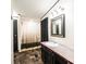 Bathroom featuring a vanity with black cabinets, and dark flooring at 51 Emily Ln, Taylorsville, NC 28681