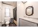 Bathroom features updated sink, mirror, cabinets, and shower at 51 Emily Ln, Taylorsville, NC 28681