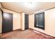 Bedroom with tan walls, brown carpet, and dark trim at 51 Emily Ln, Taylorsville, NC 28681