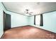 Bedroom with a ceiling fan, brown carpet, and light blue walls at 51 Emily Ln, Taylorsville, NC 28681