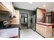Open kitchen with lots of light, light wood cabinets, and stainless steel refrigerator at 51 Emily Ln, Taylorsville, NC 28681