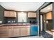 Cozy kitchen featuring modern appliances and light wood cabinets with a pop of color at 51 Emily Ln, Taylorsville, NC 28681