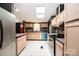 Spacious kitchen with modern appliances, light wood cabinetry, and center island with room to eat at 51 Emily Ln, Taylorsville, NC 28681